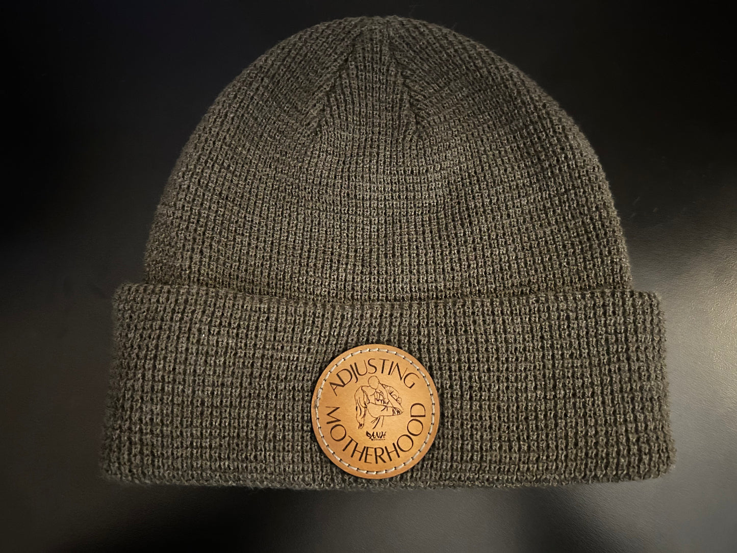 Adjusting Motherhood Knit Beanie